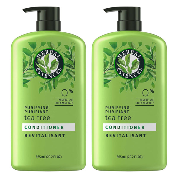 The 2 Pack - Herbal Essences Purifying Conditioner Tea Tree 29.2oz features green packaging with a sleek black pump top.
